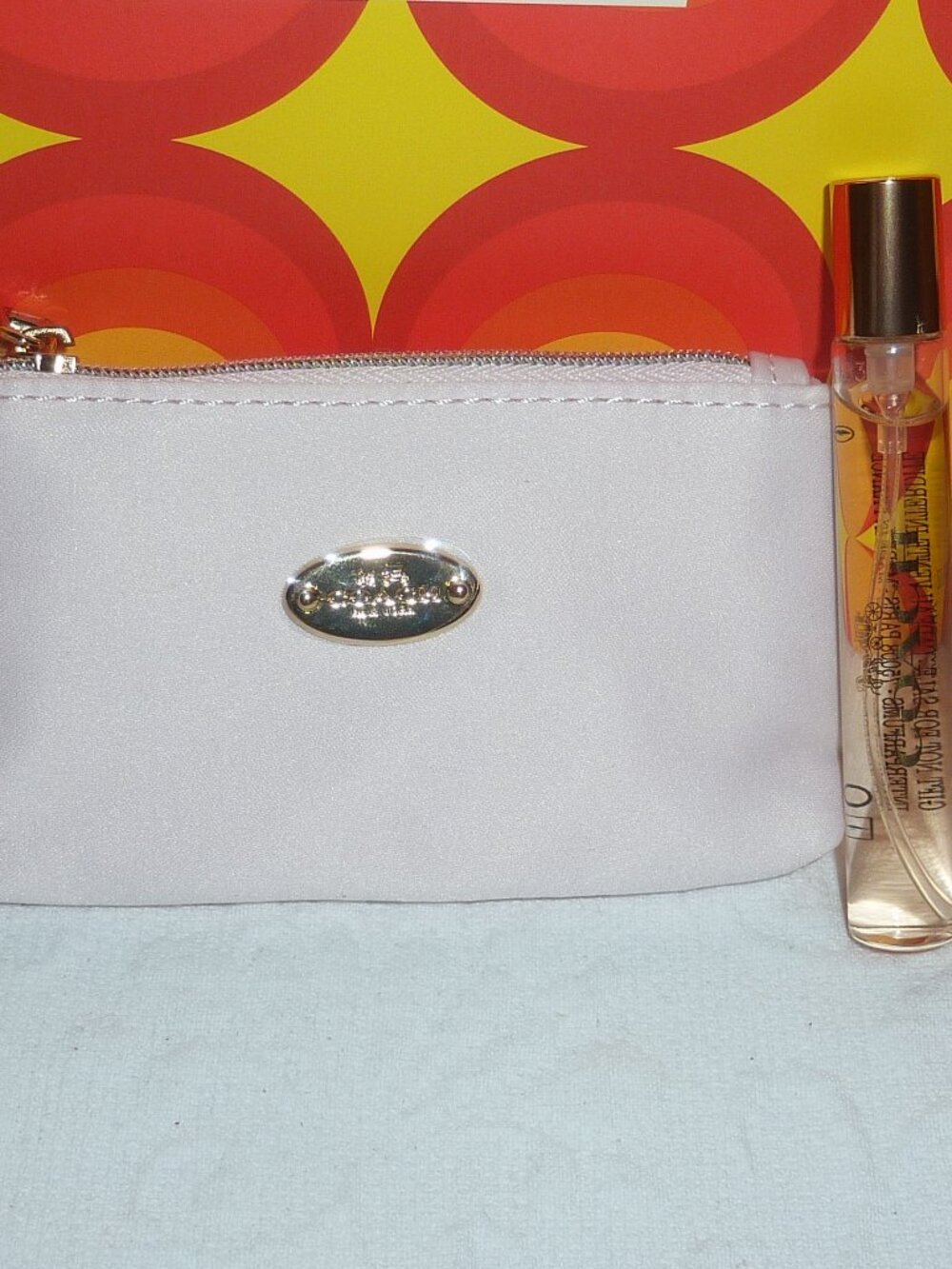 Coach Zippered Pouch Gold Tone Accents and Small Eau De Parfum Spray Perfume